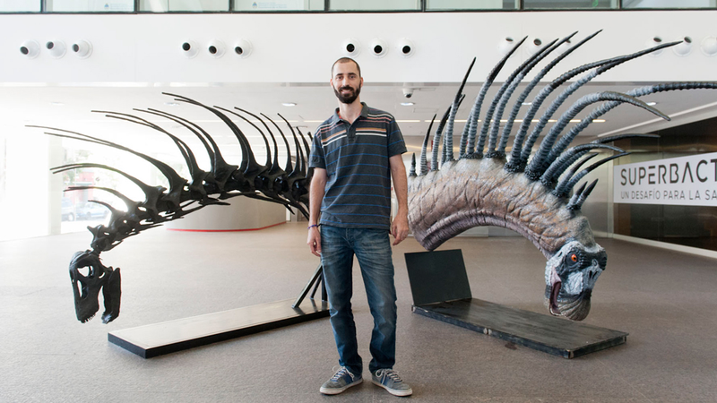Lead author Pablo Gallina posing with the new reconstructions.